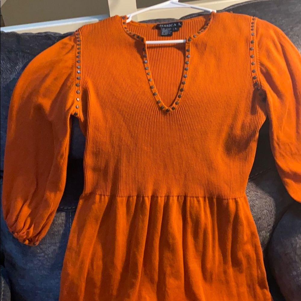 Cotton/Spandex babydoll like deep orange sweater